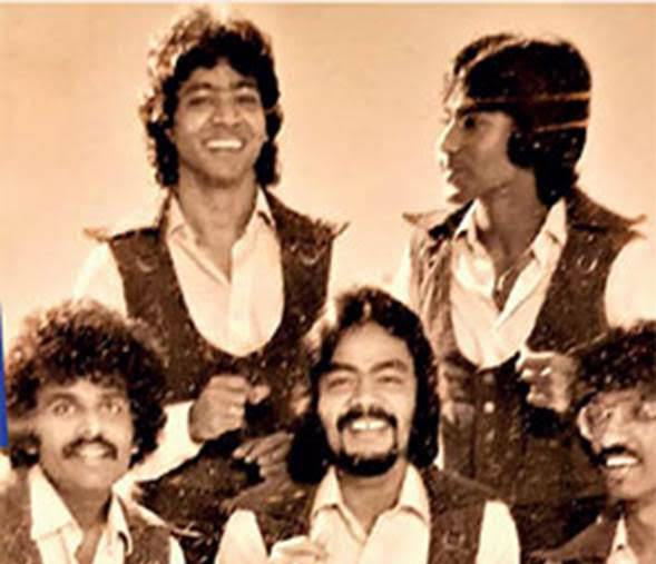 Raj and Serendib with Hassan Musafer (centre)
