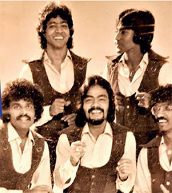 Raj and Serendib with Hassan Musafer (centre)