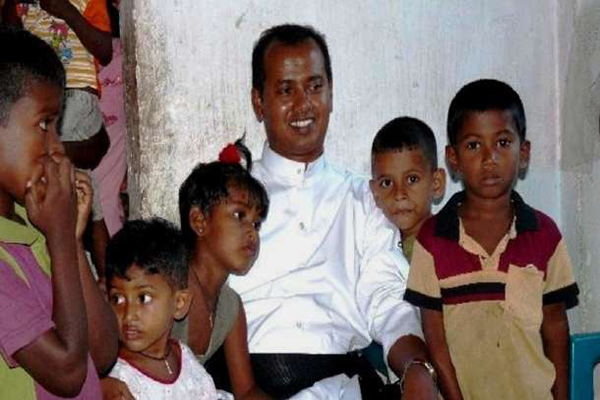 Father Dilan Perera