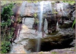 Beli Lena Caves located behind a gently cascading waterfall