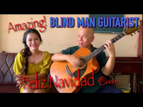 FELIZ NAVIDAD – Blind Guitarist and Percussionist in one – Amazing talent!