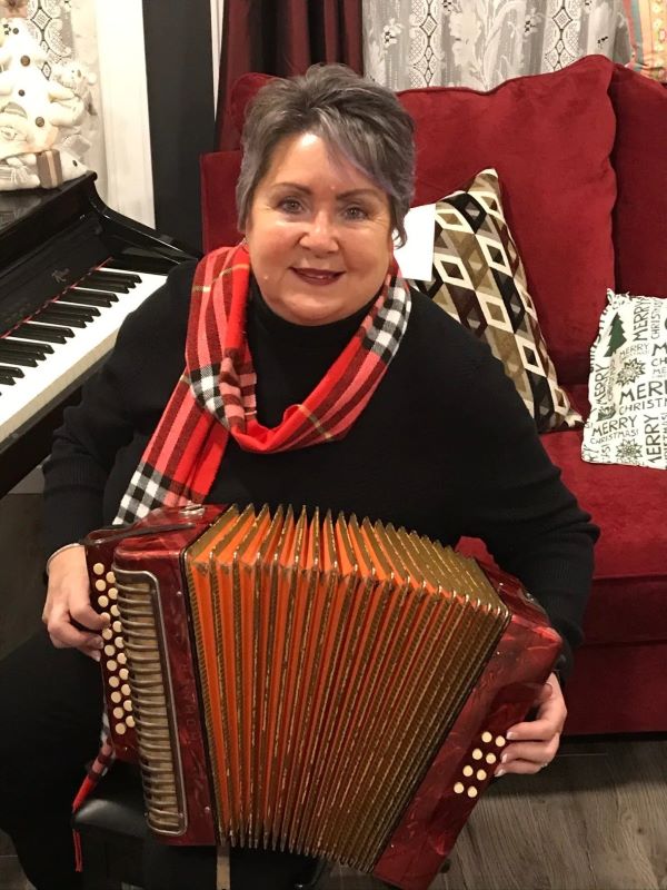 Harry Hibbs's music evoked memories of N.L. Now his accordion is making its way home