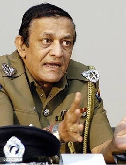 He goes into the record books of my late Alma-Mater, St.Peter's College, Bambalapitiya, Colombo, as the first Inspector General of Police who studied there. This most interesting brief-biog., was sent out to me by our good friend Keith Bennett, and I am proud to say that Chandra Fernando's story clearly shows the calibre of some exceptional students who, in later life, kept the gold, silver, and blue flag flying high, this time as an I.G.P. (top rung of the Police ladder). We, at e'Lanka do congratulate him, and voice our thanks to Keith Bennett, in the process. Desmond Kelly. (Editor-in-Chief) e'Lanka. Pre-Seventies Peterites Favorites · YtottetscsmtSerpldoaornnossoymsrd rat ee1n:m3h3 dsPM · As we approach the College centenary, I have published write ups and snippets from time to time on different aspects of College and notable personalities connected with College. But I slowed these down to allow one of two of the most important anniversaries to pass. The one that passed was on the 29th of June when College was renamed St. Peter’s and other one to come next year is an anniversary we all await with eager anticipation. Among three persons I covered before in my write ups were the Peterite Commanders of the Army, Airforce and Navy and now it is time to cover the only Peterite Inspector General of Police, Mr. Chandra Fernando. Chandra entered College in 1952 and was a student up to 1962, when he left to pursue higher studies. He excelled in sports, namely Hockey and Basketball and readily admits that excellent coaching staff and opportunities to participate in any sport of his choice enabled him to represent College in both sports. Chandra has also been a happy camper with the 40th Colombo Scout troop at St. Peter’s. Not averse to singing and dancing the ‘Baila’ he had revelled at almost every match, the Big Match in particular. Having lost his father at a very young age, his mother has been the dominant influence in his upbringing. Though not planned, his entry to the Police force had enabled him, with dedication to duty, loyalty to the institution and passion for work, to rise through the ranks to become the 29th IGP in 2004. He acknowledges that developing confidence, perseverance, decisiveness, etc. which qualities were ingrained in him while at St. Peters’ helped him in his success as a Police Officer. Though retired, Chandra now functions as the Chairman of the Police Commission. We are proud of Chandra as a Peterite and wish this Officer and Gentleman many more years to serve the motherland in whatever capacity he can.