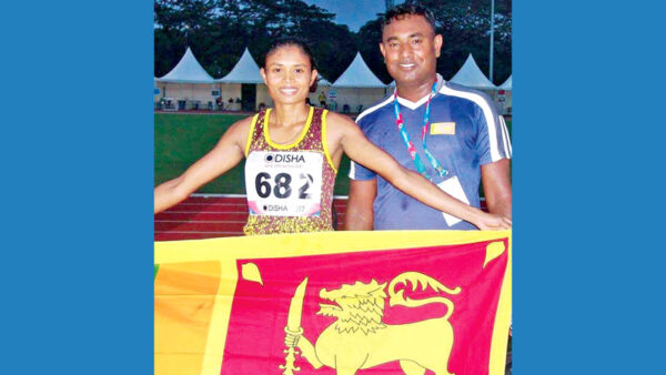 Nimali Liyanarachchi with Coach Sujith Abeysekera