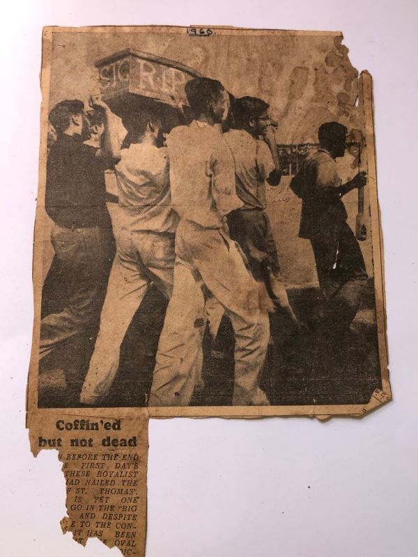 Royal Thomian 1960. Royalists are carrying coffin says STC RIP. Guy in the front carrying a spade to dig the grave. Went round the Oval 3 times. Third time Thomians attacked and a fight started.