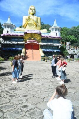 Tourists trickle in Golden Temple of Dambulla 3