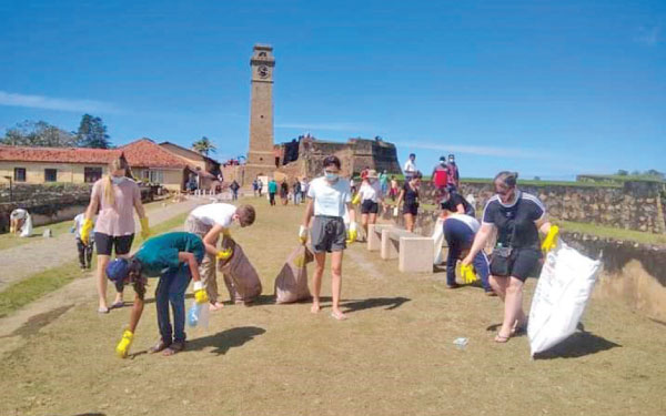 Foreigners join in cleaning up Galle Fort-by Mahinda P. Liyanage Galle Central Sp.l Corr.
