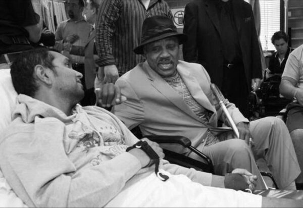 Joe Frazier talking to Dinesh Palipana in 2010 not long after a spinal cord injury changed his life forever
