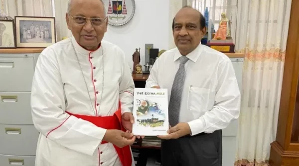 PRESENTING MY BOOK, THE EXTRA MILE TO HIS EMINENCE MALCOLM CARDINAL RANJITH