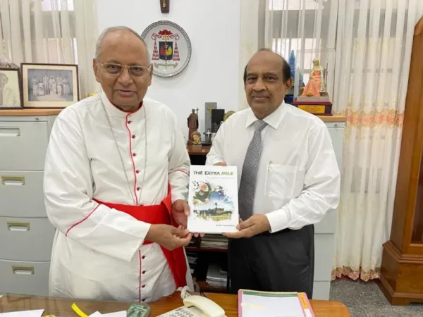 PRESENTING MY BOOK, THE EXTRA MILE TO HIS EMINENCE MALCOLM CARDINAL RANJITH