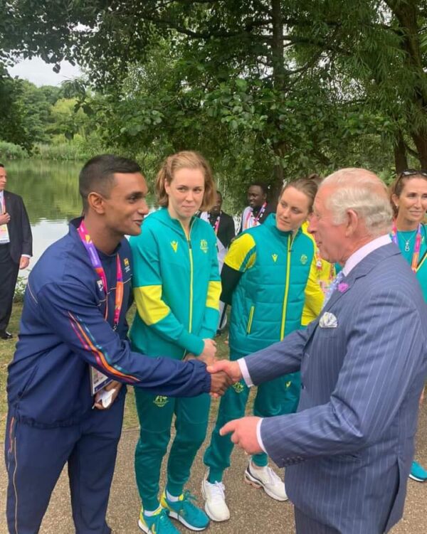 Asalanka Peiris the swim sensation being greeted by his HRH Prince Charles, the future King of England.