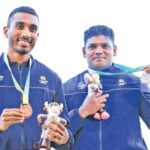 Yupun Abeykoon and Discuss thrower Palitha Bandara