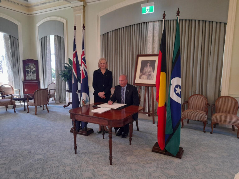 Photo of Anton Swann (Hon. Consul for Sri Lanka in Queensland) signing the Condolence book