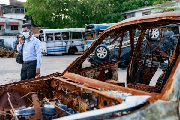 Burnt-out cars set alight by protesters after violent scenes in Colombo following a raid by Rajapaksa loyalists on the Galle Face Green protest tent village.