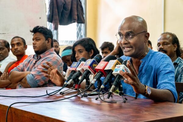 Sri Lankan protest leaders hold a press conference at a secret location to avoid arrest.