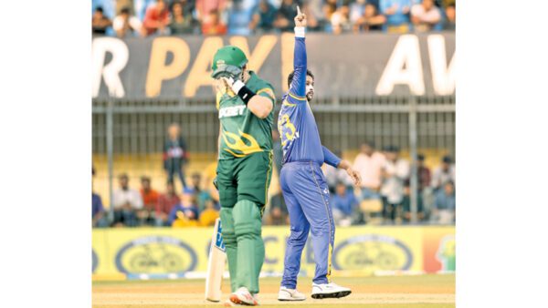 Tillakaratne Dilshan celebrates a wicket