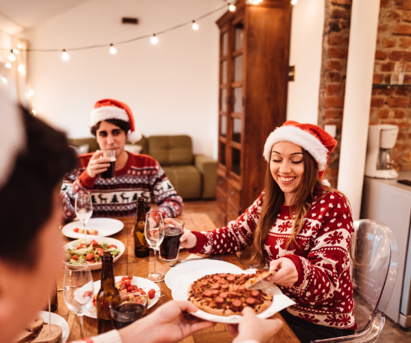 people enjoying Christmas food