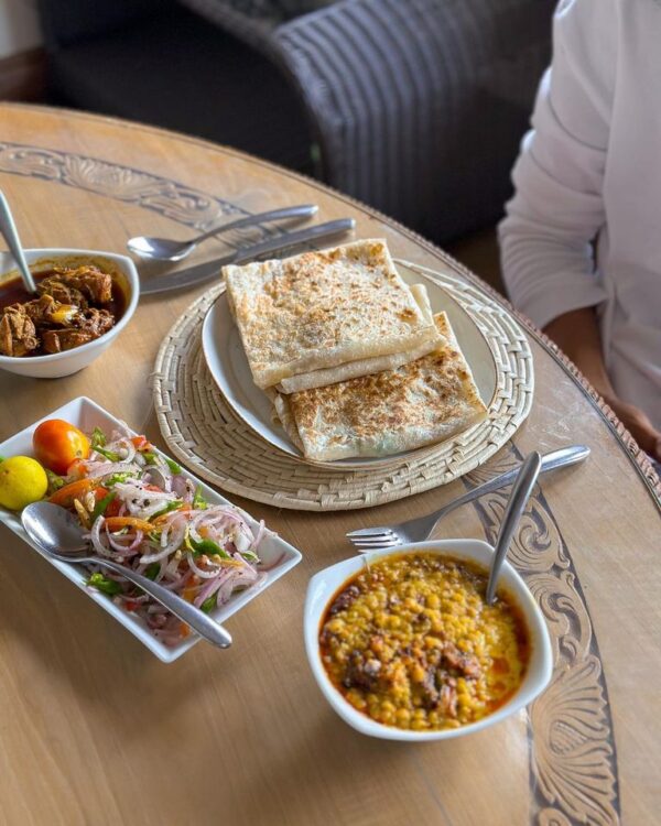 Sri Lankan goodness at its best! Our Cheese Roti, Dhal , Spicy Chicken Curry, and Onion Salad