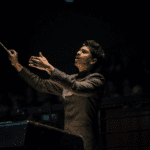 Raised in Germany and now based in Austria, Leslie Suganandarajah is the Music Director of the prestigious Salzburg Landestheater, and the first-ever conductor of Tamil heritage.