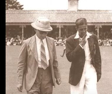 Ceylon Captain Mahadeva Sathasivam (Wesleyite) and his Australian Counterpart Donald Bradman walk cross the Oval Sports Ground in Colombo in 1948.