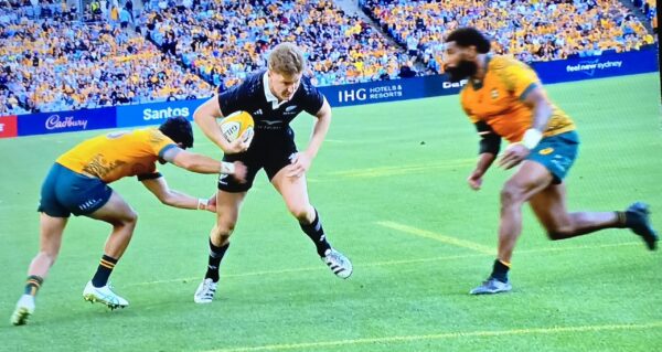 All Blacks hang on to Bledisloe Cup for another year after a riveting encounter against the Wallabies.  - BY TREVINE RODRIGO IN MELBOURNE. (eLanka Sports Editor).