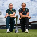 MACKAY, AUSTRALIA - SEPTEMBER 18: Alyssa Healy, captain of Australia and Sophie Devine, captain of New Zealand, pose for portraits with the trophy during a women's T20 International media opportunity at Great Barrier Reef Arena on September 18, 2024 in Mackay, Australia. (Photo by Albert Perez/Getty Images)
