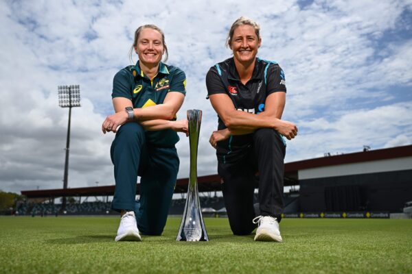 MACKAY, AUSTRALIA - SEPTEMBER 18: Alyssa Healy, captain of Australia and Sophie Devine, captain of New Zealand, pose for portraits with the trophy during a women's T20 International media opportunity at Great Barrier Reef Arena on September 18, 2024 in Mackay, Australia. (Photo by Albert Perez/Getty Images)