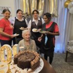celebrate Carmen De Vos's 101st birthday.