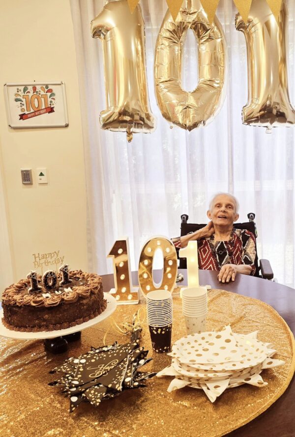 celebrate Carmen De Vos's 101st birthday.