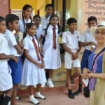 Beena with students at Dutuwewa