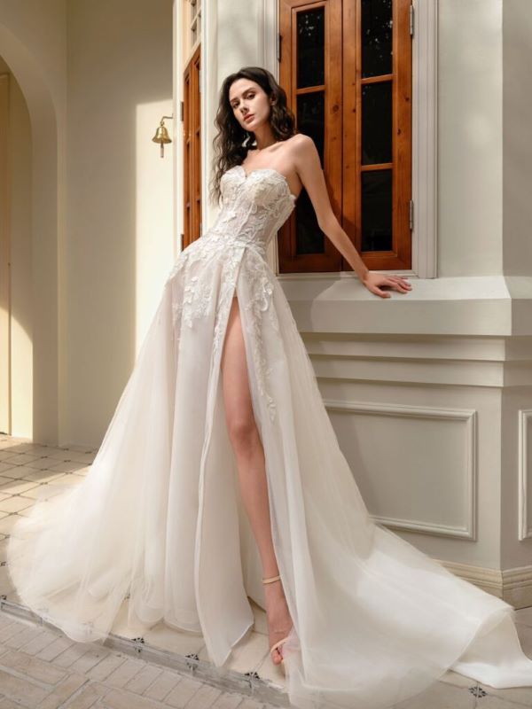 Bride wearing lace wedding dress Sydney Bridal Factory showroom