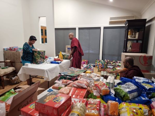 36 shipping boxes containing 103 family packages were packed over the last two days for the people impacted by floods in Sri Lanka on behalf of Dhamma Vijaya Buddhist Vihara in Hornsby, NSW