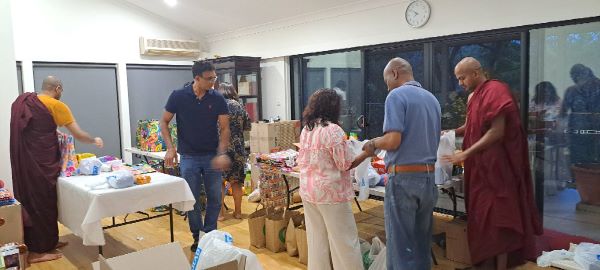 36 shipping boxes containing 103 family packages were packed over the last two days for the people impacted by floods in Sri Lanka on behalf of Dhamma Vijaya Buddhist Vihara in Hornsby, NSW