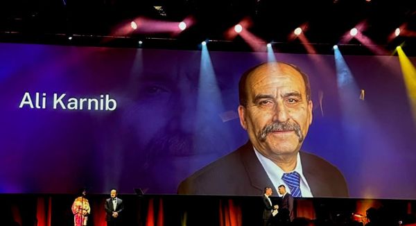 Councillor Sam Karnib receives the honour roll citation for his late father Councillor Ali Karnib from NSW Premier Chris Minns-eLanka 01