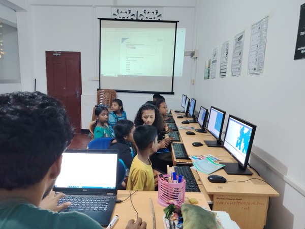 Rural Sri Lankan children participating in a Thadus CodeLabs coding programme