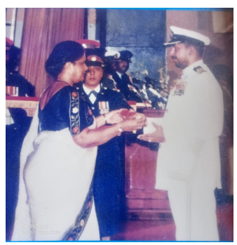 Receiving WV medal from HE the President Chandrika Bandaranaike Kumaratunga in 2001
