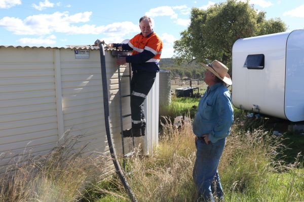 Water carter Ron Cameron and Ashford farmer Peter Rogers